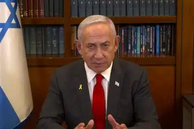 This image grab from handout video footage released by the Israeli Government Press Office (GPO) shows Prime Minister Benjamin Netanyahu giving a televised address in Jerusalem on January 18, 2025. The Israeli prime minister on January 18 said that Israel reserves the right to resume fighting in Gaza with US support, as he pledged to bring home all hostages held in the Palestinian territory. (Photo by GPO / AFP) / Israel OUT / XGTY / === RESTRICTED TO EDITORIAL USE - MANDATORY CREDIT 