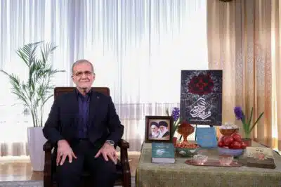 This handout picture provided by the media office of the Iranian presidency shows the Islamic republic's President Masoud Pezeshkian during the annual address to the nation for Nowruz, the Persian New Year, in Tehran on March 20, 2025. Millions of people across the Middle East, Asia and eastern Europe celebrate the Nowruz New Year festival, which marks the start of spring. Known for a long time as the Persian New Year, its roots comes from a feast day in the Zoroastrian religion and it is marked by peoples of different ethnicities and faiths including the Kurds and the Afghans. (Photo by Iranian Presidency / AFP) / RESTRICTED TO EDITORIAL USE - MANDATORY CREDIT 