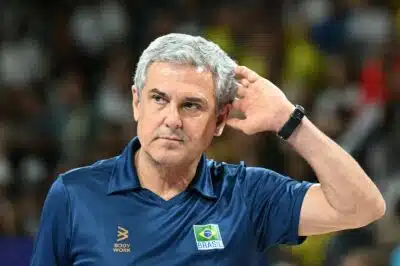 Brazil's head coach Jose Roberto Lages Guimaraes looks on during the volleyball women's quarter-final match between Brazil and Dominican Republic during the Paris 2024 Olympic Games at the South Paris Arena 1 in Paris on August 6, 2024. (Photo by Natalia KOLESNIKOVA / AFP)