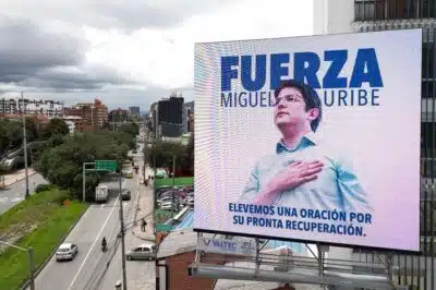 An aerial view shows a billboard reading 