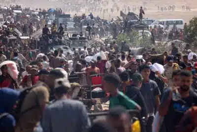 Displaced Palestinians gather to receive aid at a distribution centre run by the US and Israeli-backed Gaza Humanitarian Foundation (GHF) at the so-called 